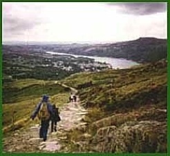 Homeward bound down the Llanberis Path in 1988.  Lyn Padern can be seen in the distance.